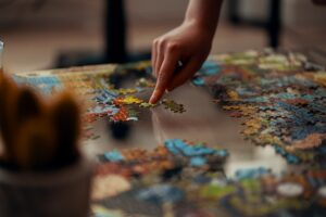 person working on a puzzle